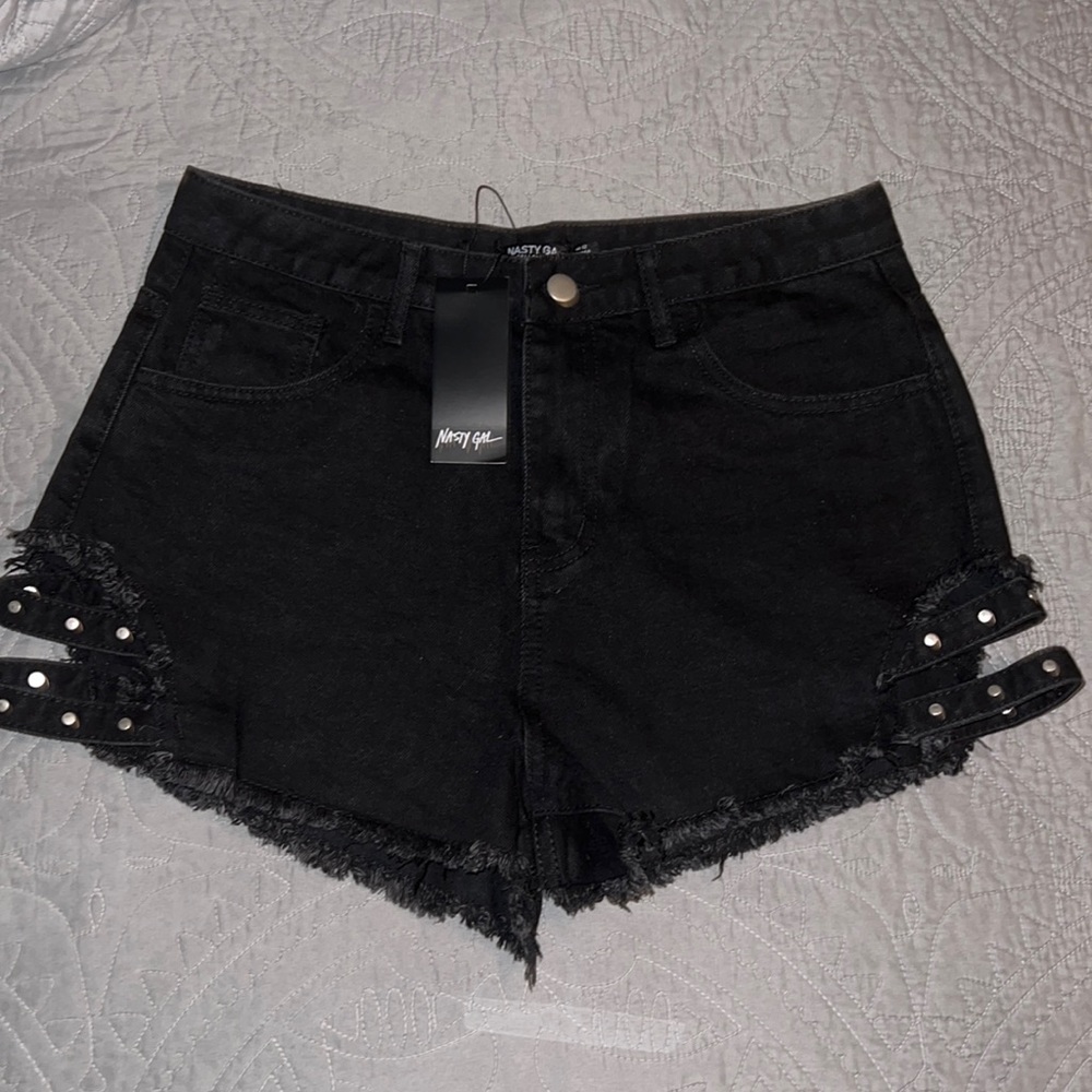 NWT Nasty Gal Cut it Out Pin Studded Denim Shorts in black. Size 12.